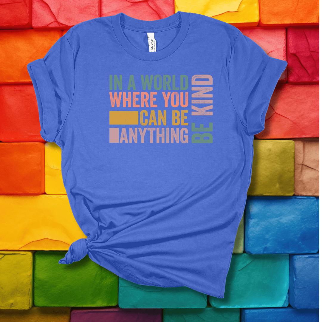 Printify T-Shirt Heather Columbia Blue / S In a world where you can be anything...be kind!